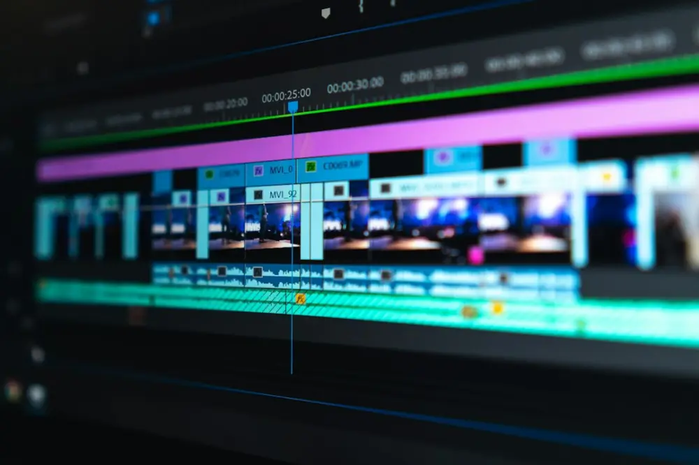 A video editing timeline with blue and purple clips on a dark screen, illustrating sports video craft